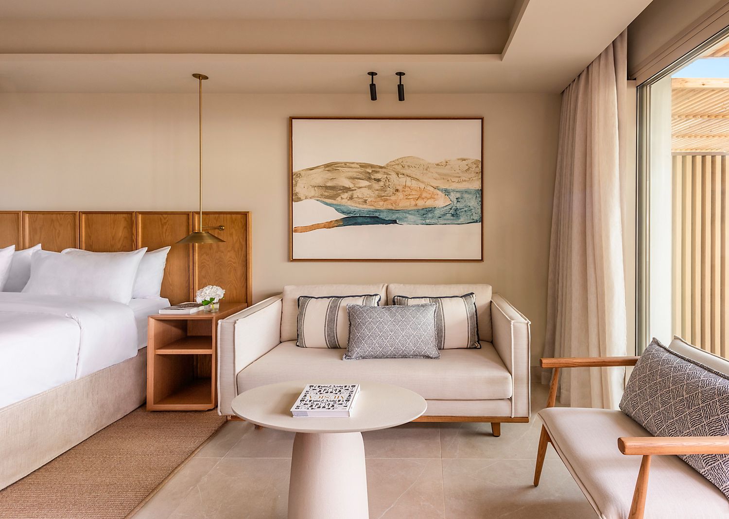 Fairmont King bedroom and sitting area at Fairmont La Hacienda Costa del Sol