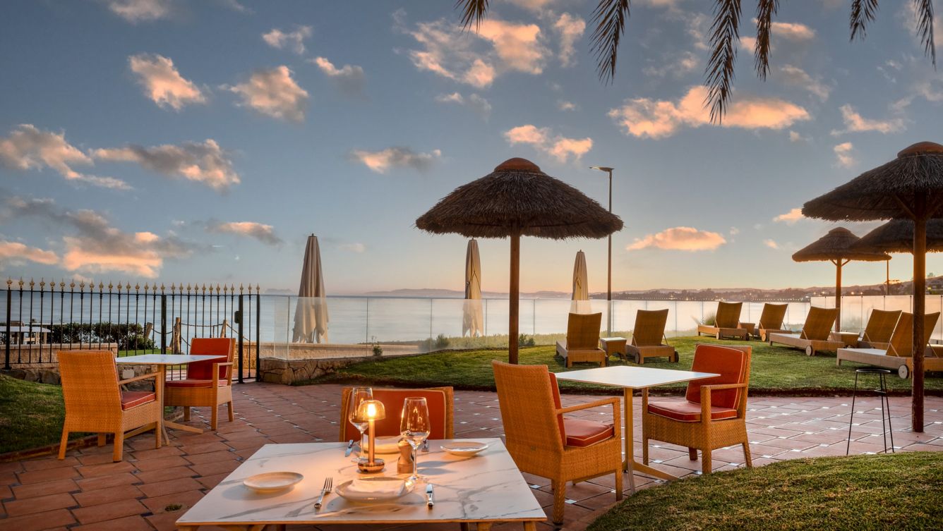 Outdoor dining terrace at Grand Hotel Las Dunas