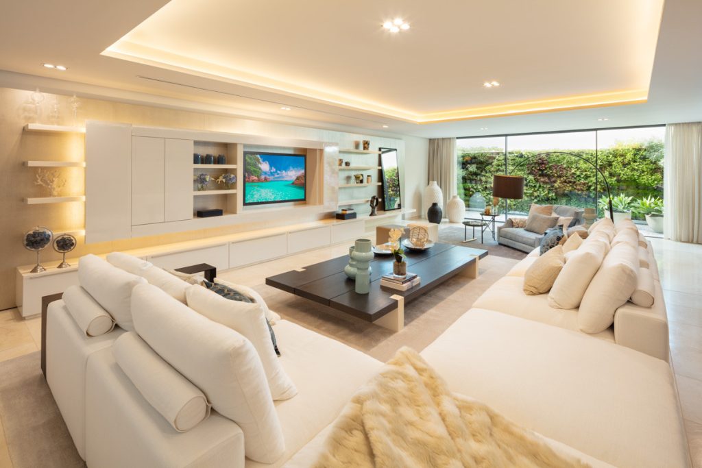 Living room overlooking the garden — La Cerquilla Residence