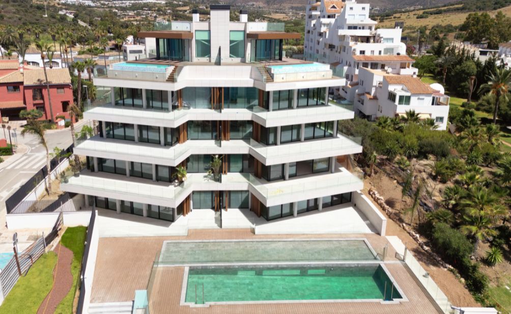 The completed Sapphire building with broad terraces and its outdoor swimming pool