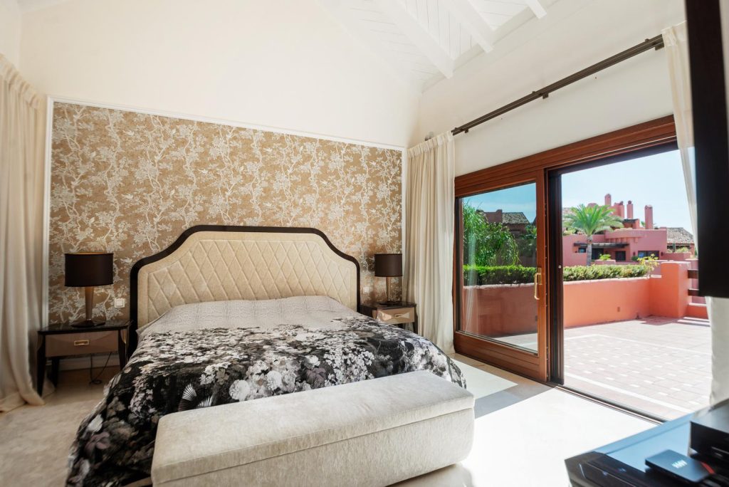 Bedroom opening onto a terrace — Torre Bermeja Penthouse